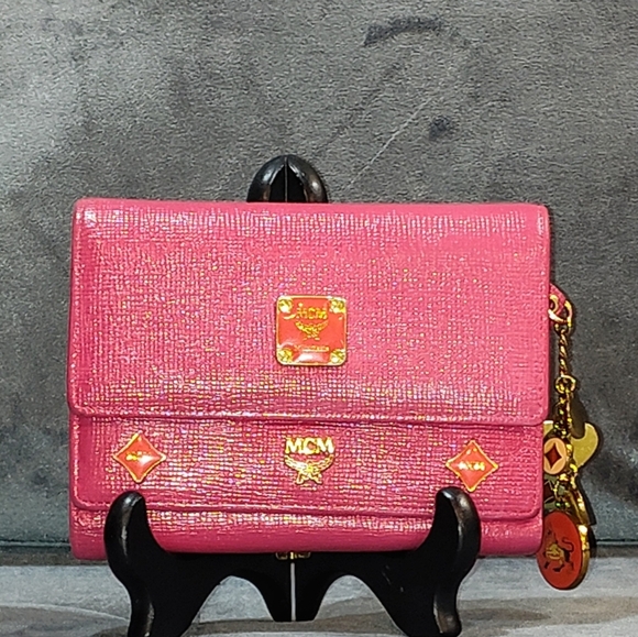EUC MCM SAFFIANO LEATHER COMPACT WALLET DECORATIVE METAL MCM BAGDES & CHARMS